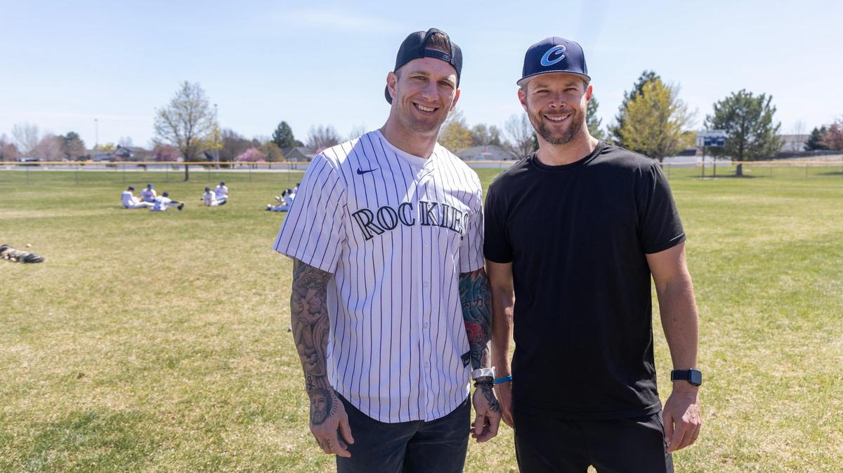 Former Major League Baseball player Brandon Barnes, left, and entrepreneur David McMenomey, right, along with coaches and fathers Troy Croghan and Zach Mason, are the True Gritt team.
