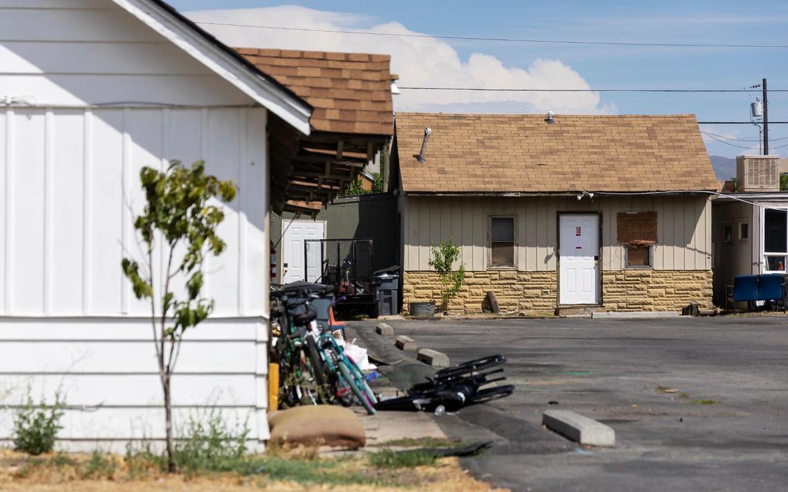 A couple days after the motel closed, personal belongings, like bikes and a wheel chair, still littered the parking lot.