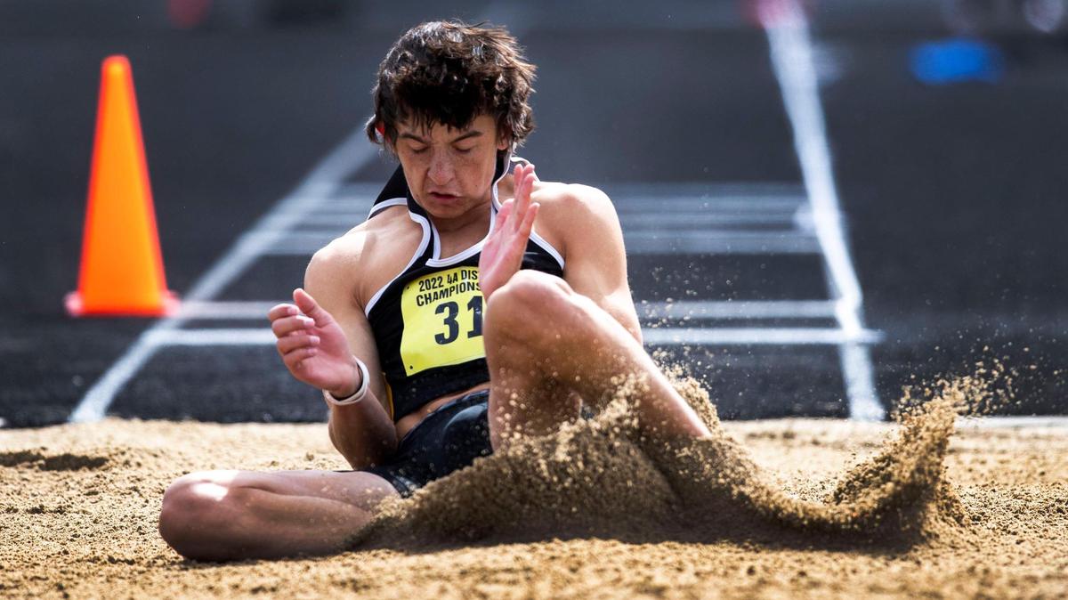 Bishop Kelly junior Patrick Monahan leaped a meet record 22 feet, 1.5 inches to win the boys long jump title during the 4A District Three track and field championships Saturday at Ridgevue High School.