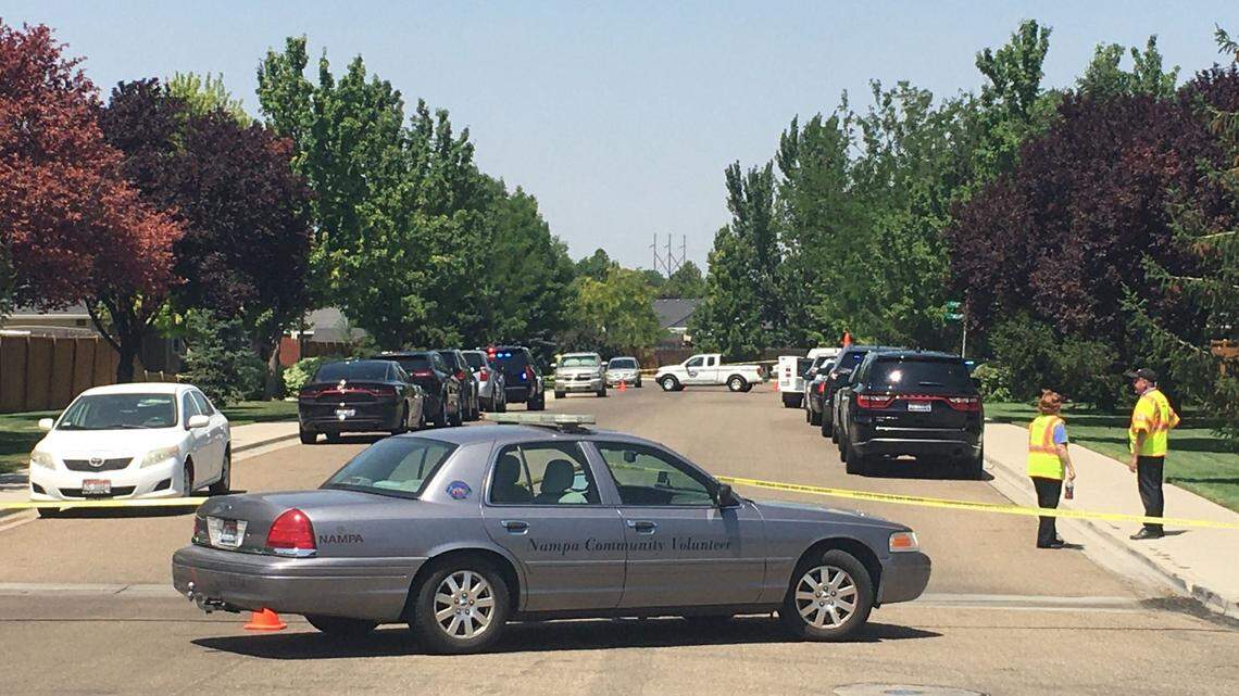 A Nampa community volunteer vehicle blocks South Raintree Drive in Southwest Nampa on Friday, July 16, 2021, as police investigate an incident.