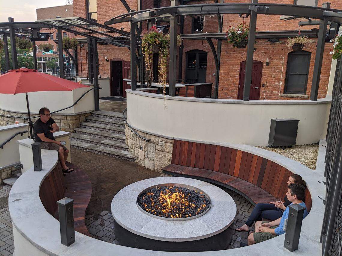 The multilevel Ochos back patio has two flaming features, including a circular fire pit.