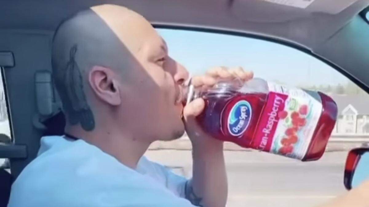 Nathan Apodaca sips on some Ocean Spray while driving around in his new 2020 Nissan Frontier truck back in October.