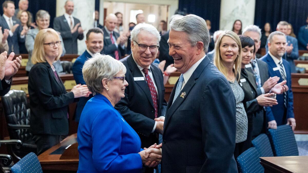 Gov. Brad Little is greeted by members of a joint gathering of the Idaho Legislature before he gives his his annual State of the State speech, Monday, Jan. 9, 2023.