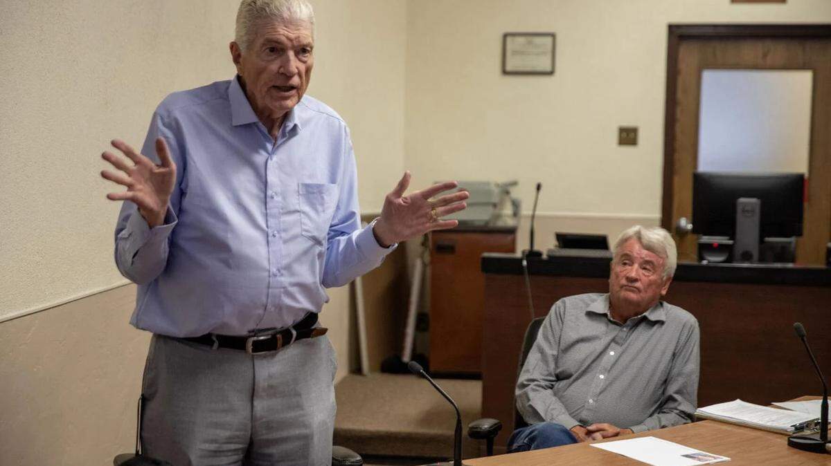 Project manager Dan Adamson shares details of a proposal to build a 462-megawatt nuclear reactor in Jerome County at a public meeting on July 21, at the Jerome County Courthouse, as Roy Prescott, owner of Sawtooth Energy and Development Corporation, listens.