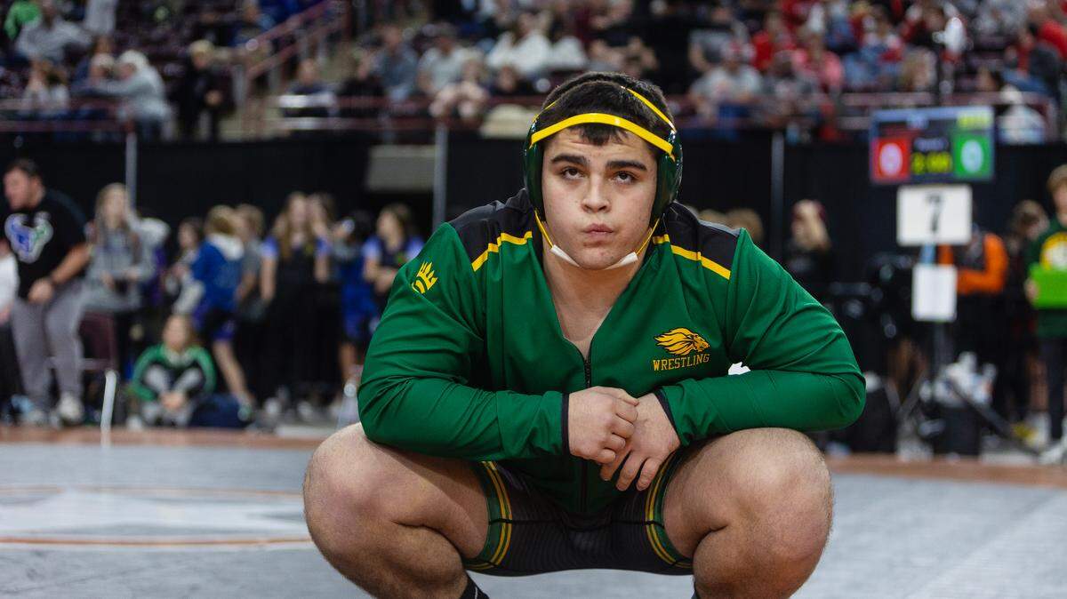 Borah High grad Aden Attao repeated as the junior heavyweight Greco-Roman national champion in Fargo, North Dakota, last week, leading Idaho to its first team championship in any style. Above, Attao prepares for the championship match at the Rollie Lane Invitational in January in Nampa.