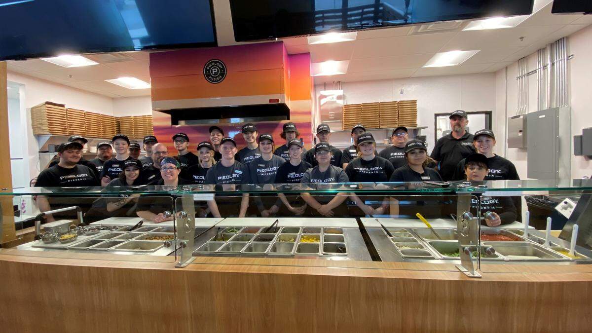 Employees at Pieology in Kuna are ready to make pizzas.