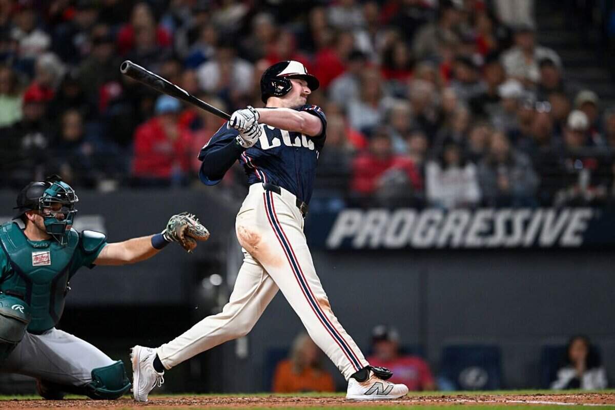 CLEVELAND, OHIO - AUGUST 29: Kyle Manzardo #9 of the Cleveland Guardians hits a solo home run during the sixth inning against the Seattle Mariners at Progressive Field on August 29, 2025 in Cleveland, Ohio. (Photo by Nick Cammett/Getty Images)