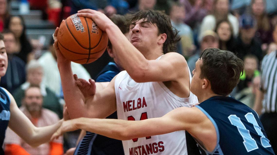 Melba post Cache Beus draws a foul against Ambrose on Feb. 4 at Melba High.