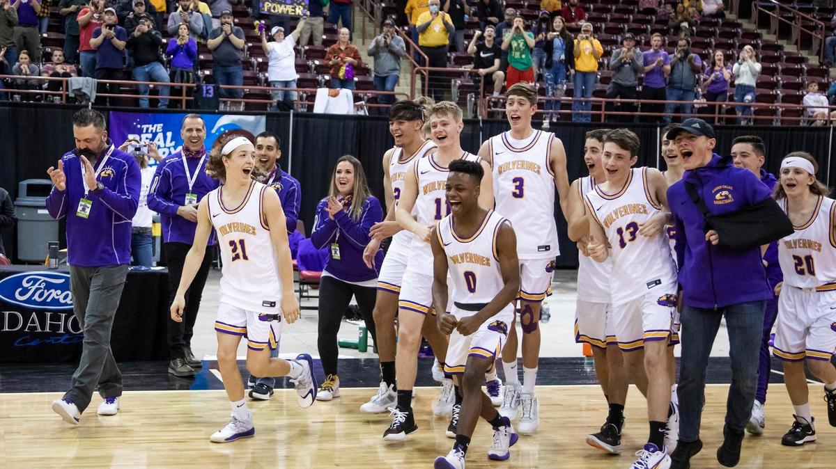 Garden Valley celebrates as they are named the 1A Division II boys basketball state champions Friday after defeating Dietrich 88-73 at the Ford Idaho Center in Nampa.