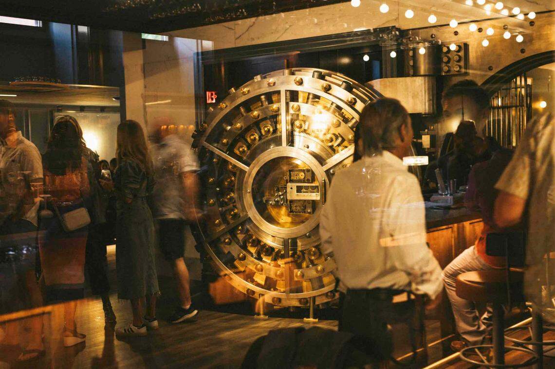 The interior includes a 15-ton vault door leading to a unique seating area.