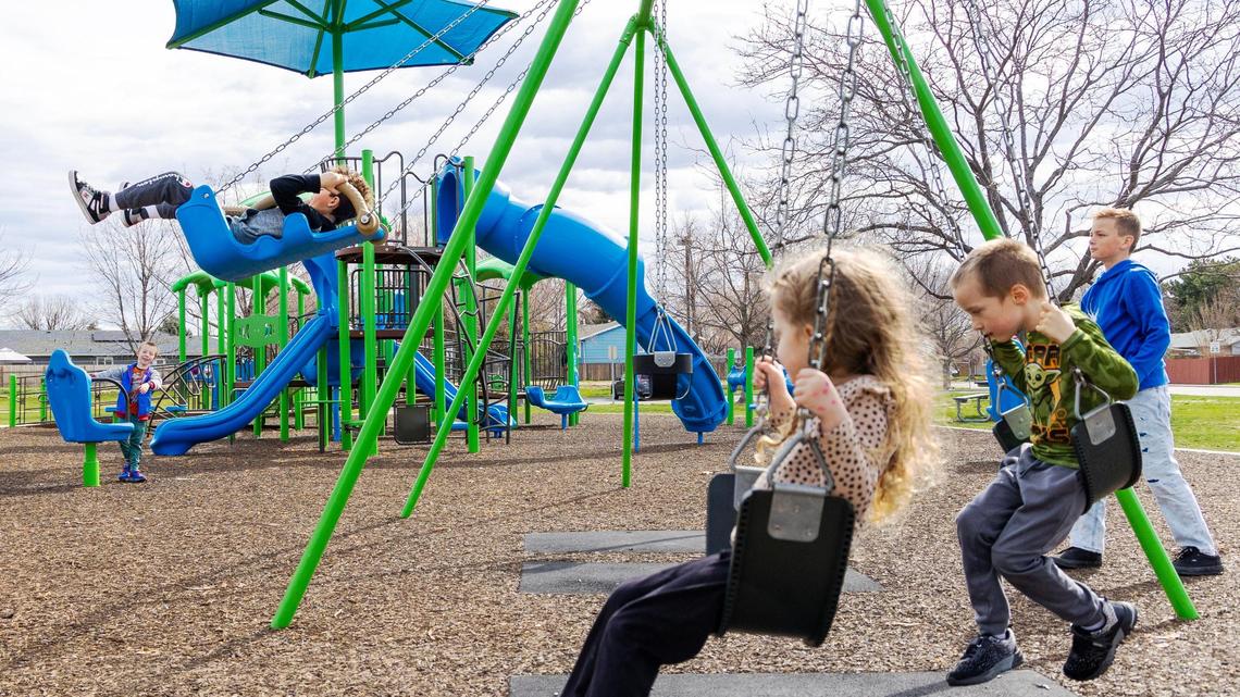 Children play at Meridian’s renovated Chateau Park. It is a neighborhood park owned by the city, which it renovated last year to make inclusive for all children and abilities.