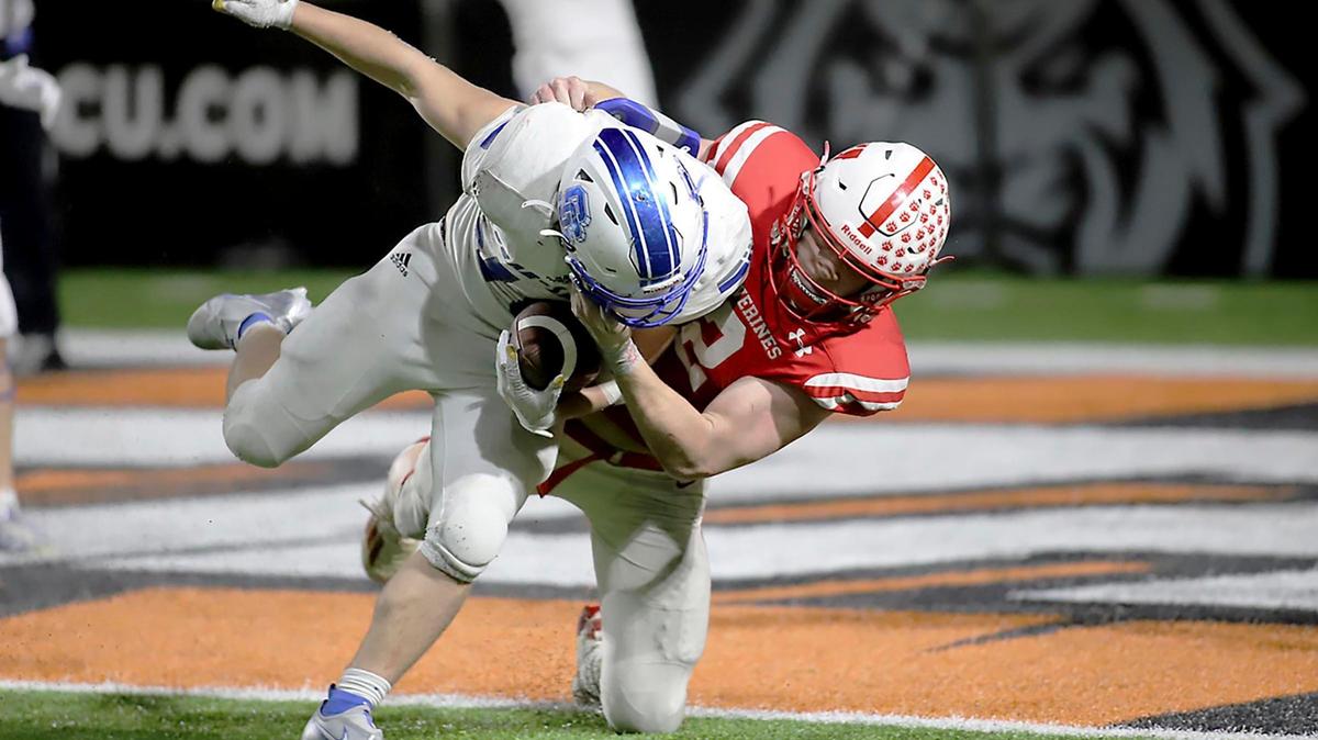 Weiser senior Brett Spencer makes the championship-winning tackle, dropping Sugar-Salem’s Carson Harris just shy of the goal line during the second overtime Friday night. That tackle allowed the Wolverines to hang on for a 34-33 win and their first state title since 1997.
