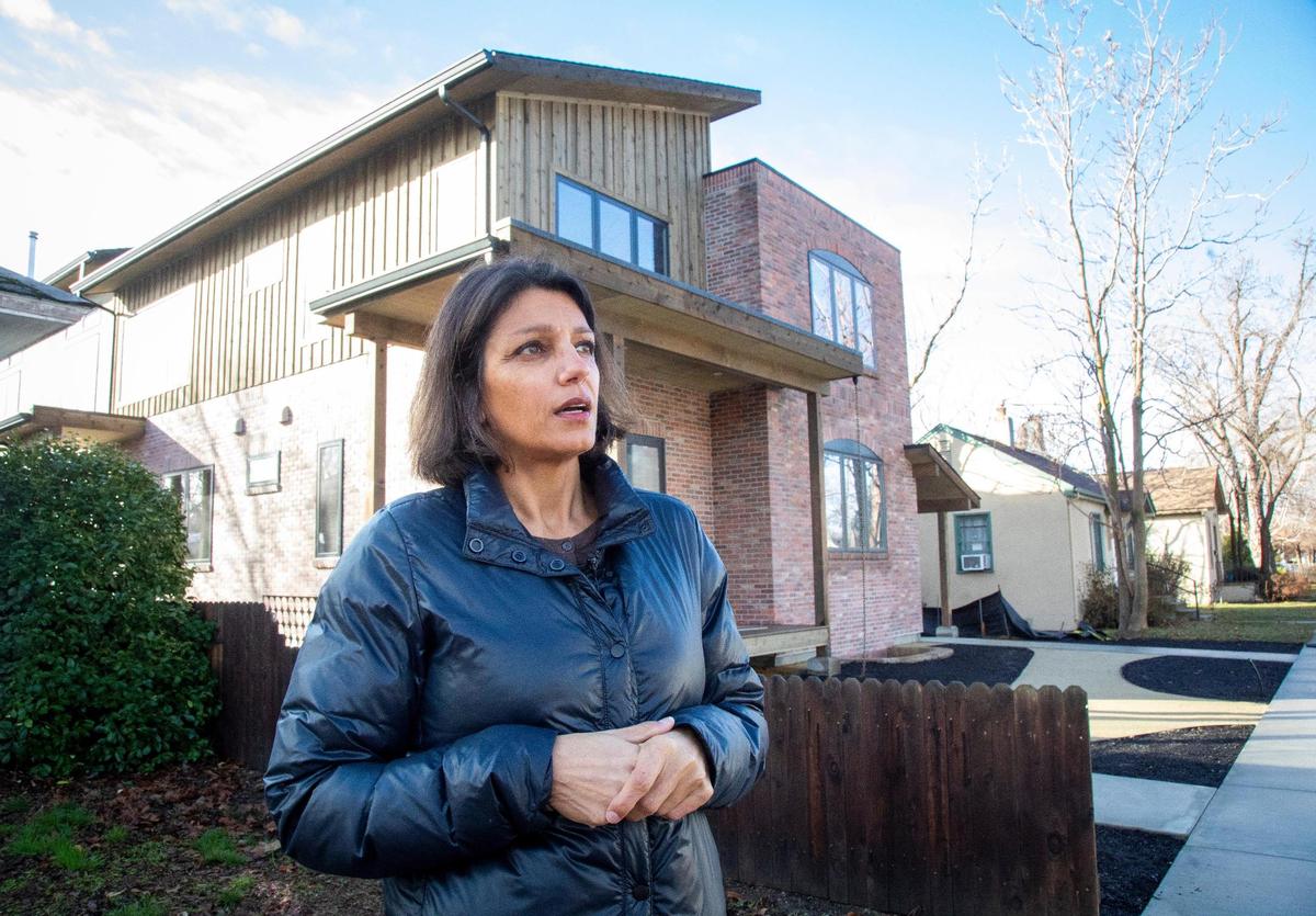 Zoning codes, like parking minimums, limited how many housing units Nirmala Sandhu could build on her small lot just west of downtown. Sandhu asked the city: “So what you’re saying is this is zoned high-density? But design requirements are so strict, I can only make a duplex.”