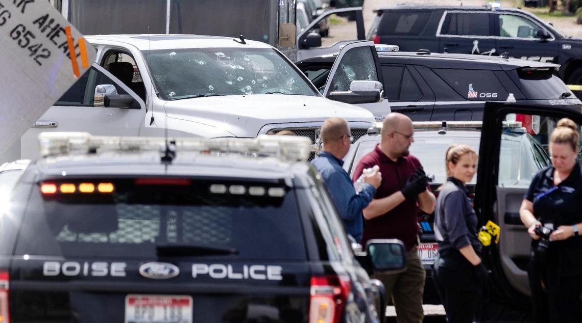 Bullet holes can be seen on the windshield of white truck on Broadway Ave. in Meridian after a police-involved shooting occurred on Thursday, June 9, 2022. According to authorities, a man fled an earlier shooting in Garden City and later exchanged gunfire with police in downtown Meridian where he was injured and transported to a hospital.