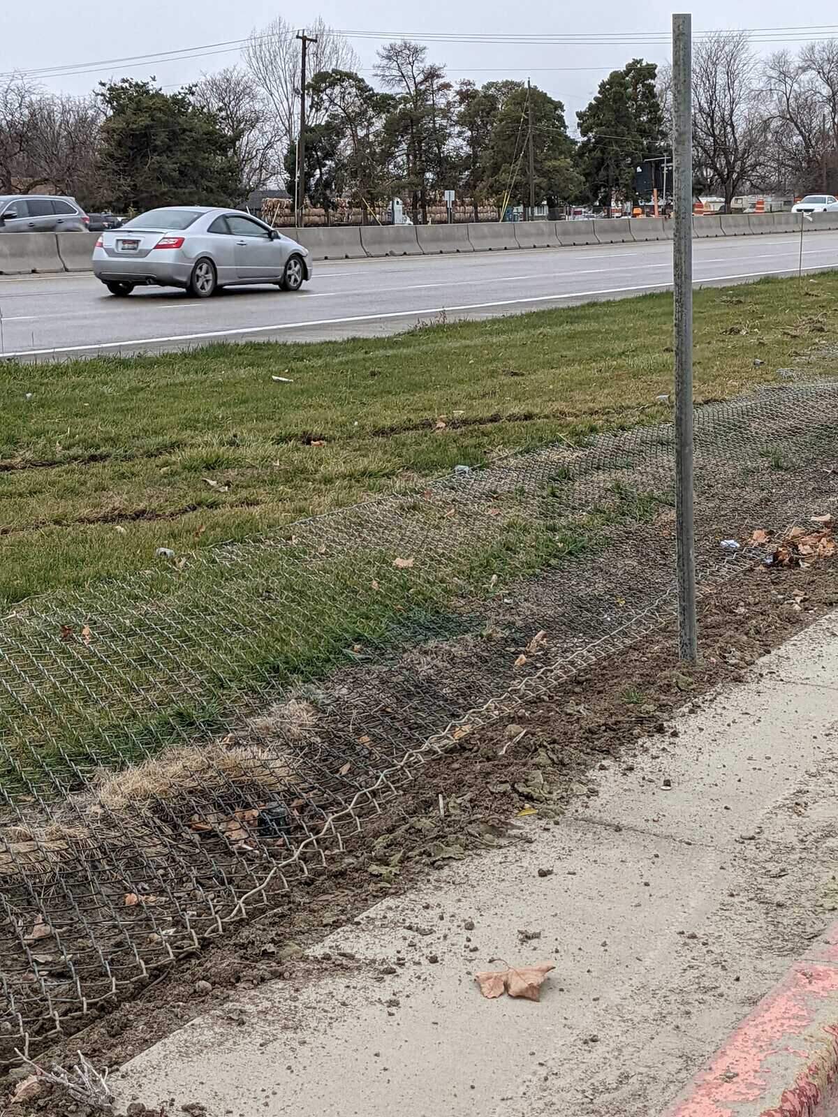 A truck hit three fences after it lost control on the interstate.
