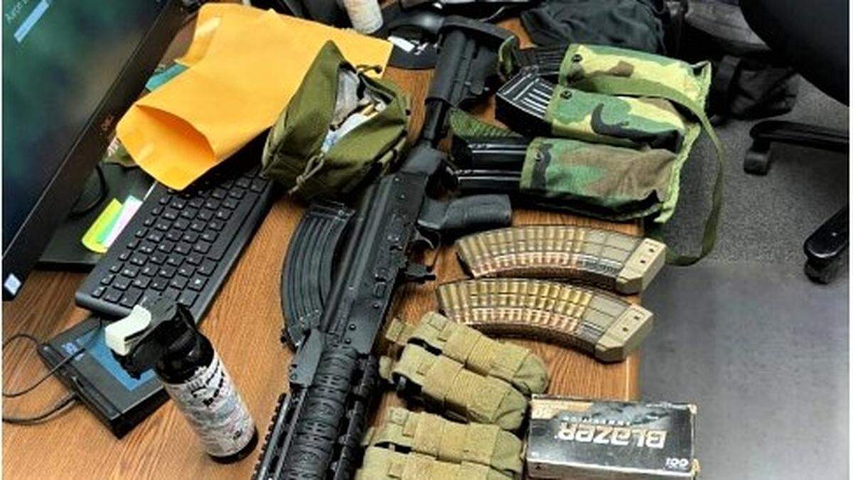 In searches of his property, agents found the convicted felon was in possession of four firearms, twelve magazines, spare rounds of ammunition and other gear, according to a sentencing memorandum.