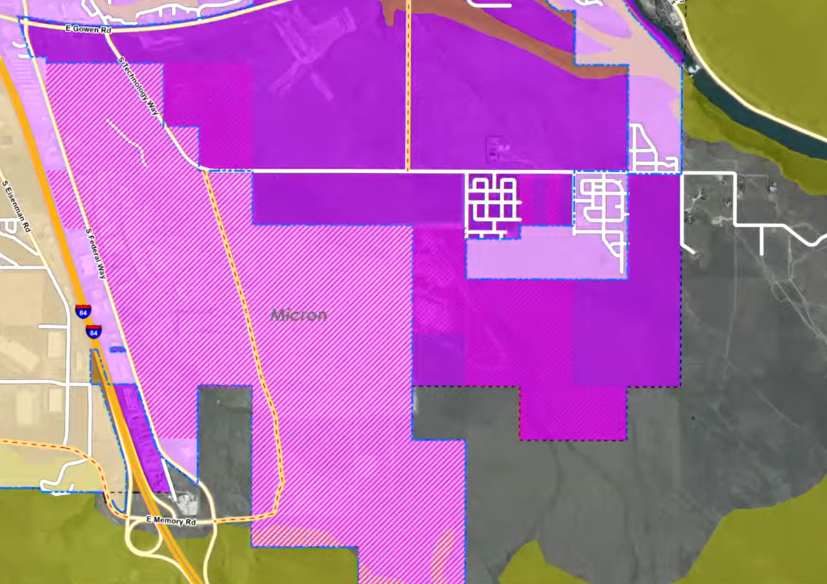A map of the potential East Columbia neighborhood is shaded purple. Micron’s campus is shown in pink hashed lines on the left. 