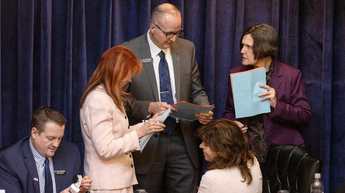 Rep. Karen Hanks, second from left, R-St. Anthony, Rep. Ron Nate, R-Rexburg, Rep. Dorothy Moon, R-Stanley, and Rep. Judy Boyle, R-Midvale talk before a floor session in this 2022 file photo.