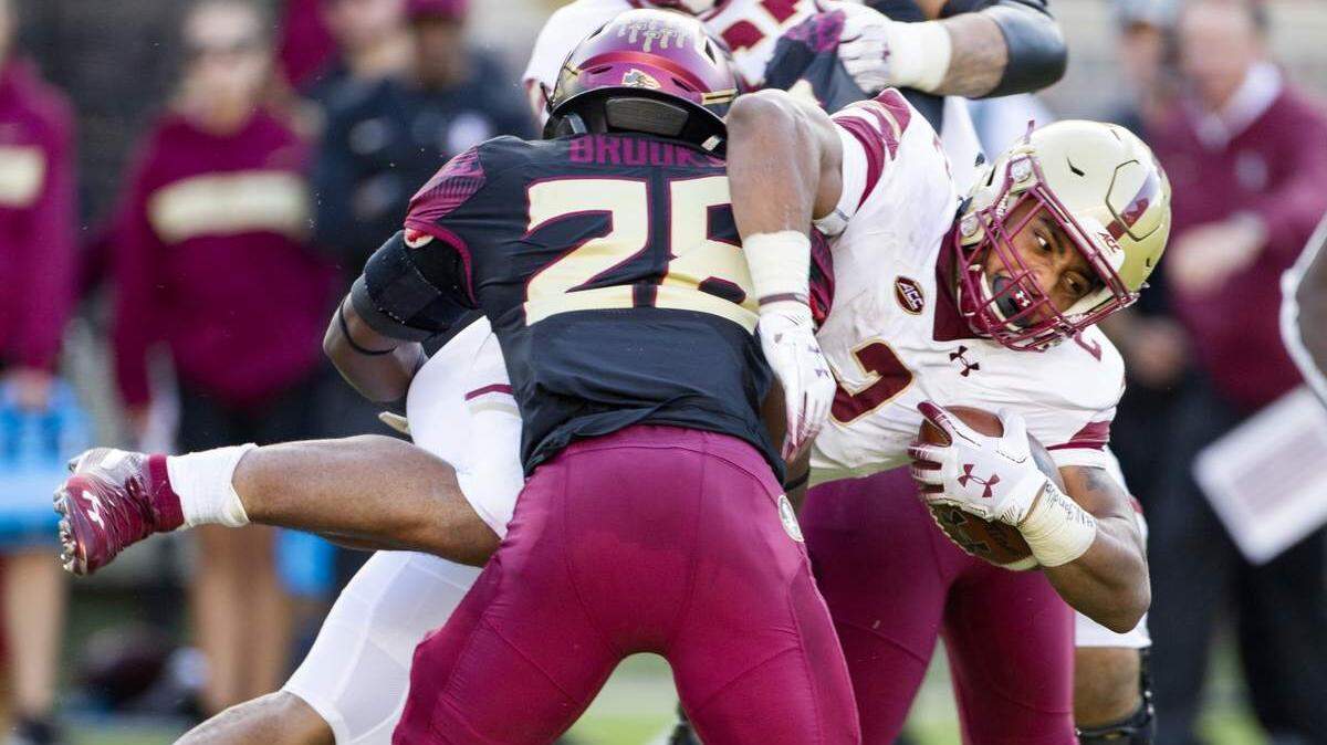 Boston College running back AJ Dillon reaches for extra yardage Nov. 17 at Florida State.