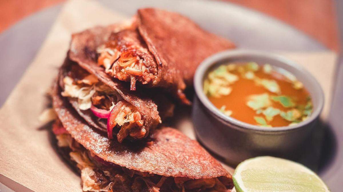 Cochinita Pibil, a slow-roasted pork dish, at Amano’s in Caldwell.