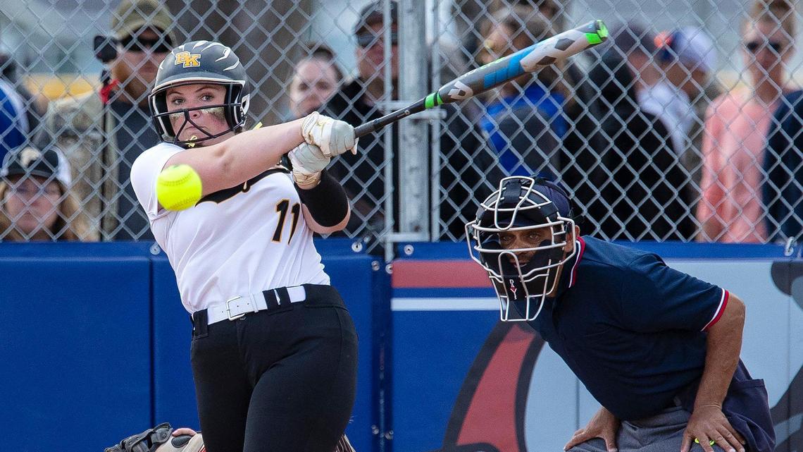 Bishop Kelly senior Pilar Cook singles in the fifth inning of the 4A District Three Tournament championship game against Vallivue at West Park in Nampa on Thursday.