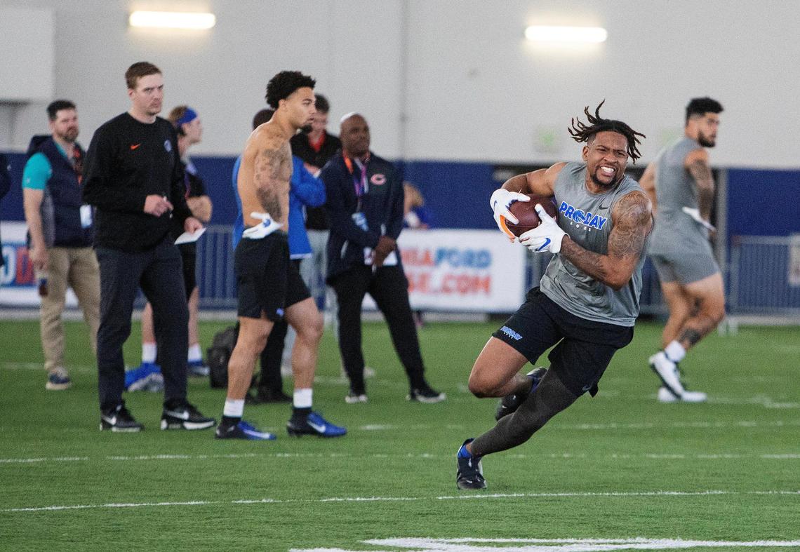 Boise State University football wide receiver Khalil Shakir runs a position drill for Pro Day at the Caven-Williams Sports Complex on Wednesday, March 30, 2022.