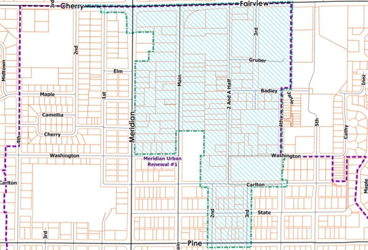 Meridian planning officials propose to remove the area marked with diagonal lines from the Downtown Revitalization District to form a new Northern Gateway District. The Downtown Revitalization District boundary is shown with thick dotted lines at the top, right and left edges of this image. A property of vacant farmland would also be included in the Northern Gateway District. It is out of the image in the upper left corner, north of Cherry Lane and west of Meridian Road.