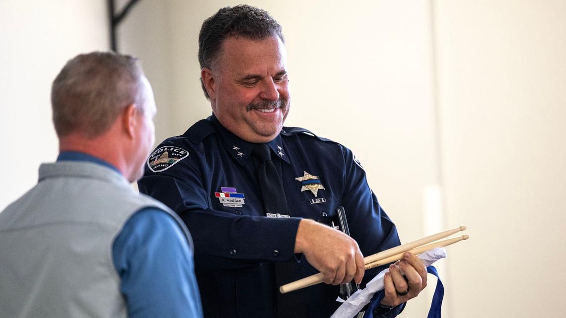 Boise Chief of Police Ron Winegar, right, at a retirement ceremony Thursday. After the celebration, he said he was concerned about rising rates of assaults against officers on duty.