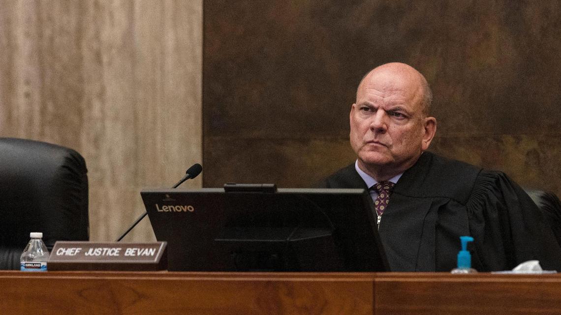 Chief Justice G Richard Bevan listens as representatives from counsel make their cases for procedures in two lawsuits pertaining to Idaho abortion laws: the state trigger law and the law allowing people to sue abortion providers at the Idaho Supreme Court in Boise on Wednesday, Aug. 3, 2022.