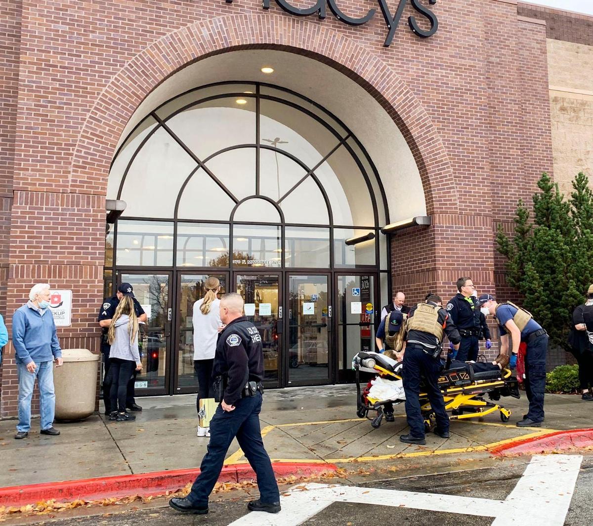 Police and emergency crews respond to a reported shooting incident at Boise Towne Square Monday, Oct. 25, 2021. Two people were killed and four injured in the shooting.