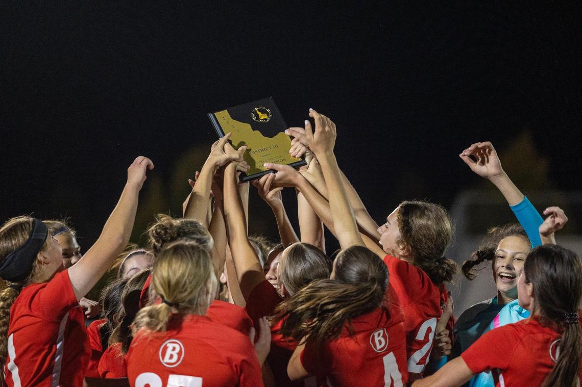 The Boise girls soccer team celebrates its second straight district title Wednesday after edging Timberline in a shootout at Mountain View.
