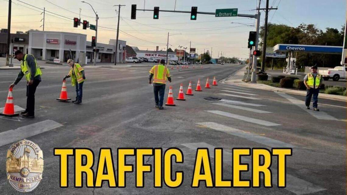Nampa officials close off Orchard Avenue and Caldwell Boulevard after a sinkhole began developing on Tuesday morning.