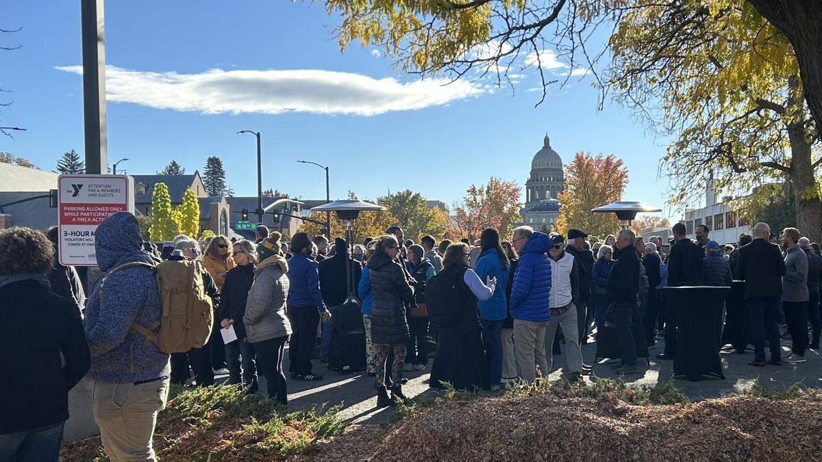 Dozens of attendees gathered to celebrate the groundbreaking of the new CapEd Downtown Boise YMCA. The new building would be built behind the crowd pictured here, with the Idaho Capitol in background.