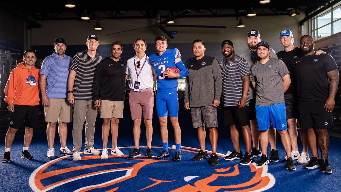 Corona Del Mar High School quarterback Kaleb Annett poses with the Boise State football coaches during a visit to campus on June 13. Annett verbally committed on Tuesday.