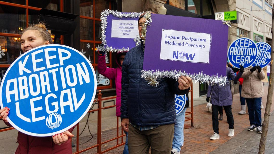 People march with the SW Idaho chapter of the National Organization for Women (NOW) in 2023 in downtown Boise to call attention to women’s health care issues such as abortion, Medicaid coverage and maternal mortality rates.