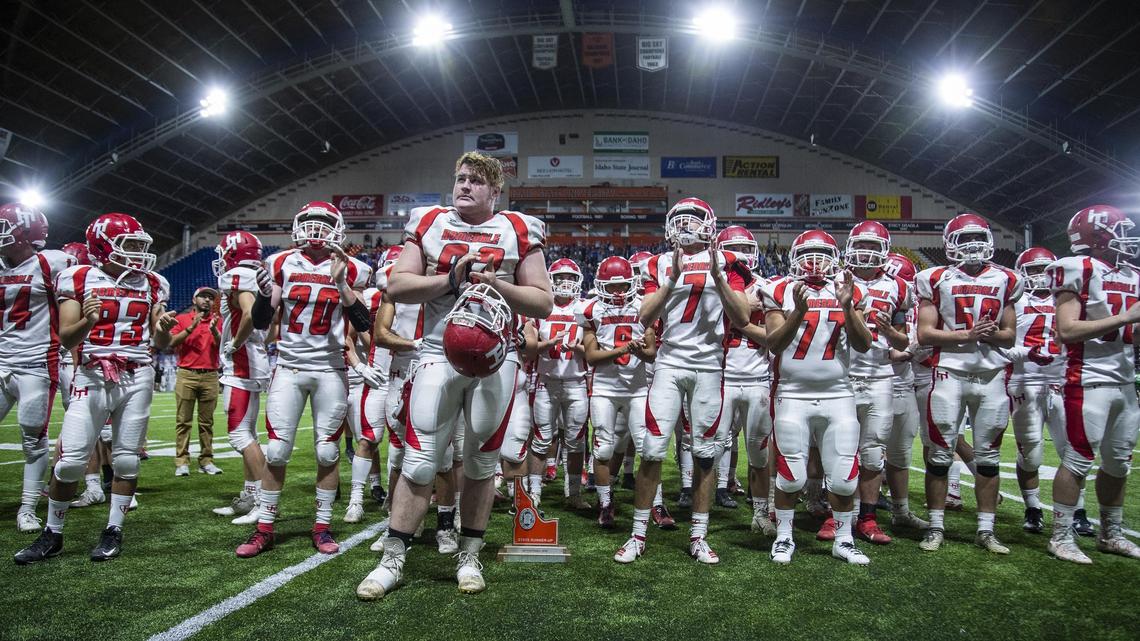 Homedale’s football team applauds the fans who traveled to the 3A state football championship game Saturday, Nov. 23, 2019 at Holt Arena in Pocatello. Homedale lost to Sugar-Salem 48-14 and were awarded the second place trophy.