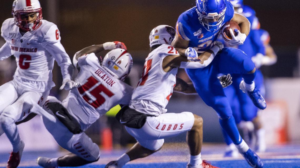 Boise State running back George Holani carries the ball during a game against New Mexico in Albertsons Stadium. On Monday, Boise State confirmed it has tested at least 230 athletes, coaches and staff members and discovered four positive results within the athletic department.