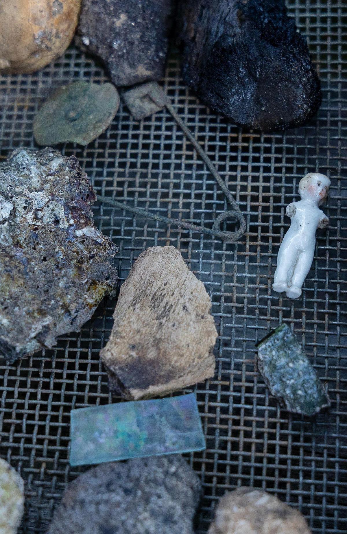Artifacts including cupels, nails, crucibles and fragments of a wash basin and a chamberpot were discovered at an archaeology dig outside of the State Historic Preservation Office in downtown Boise, June 11, 2025.