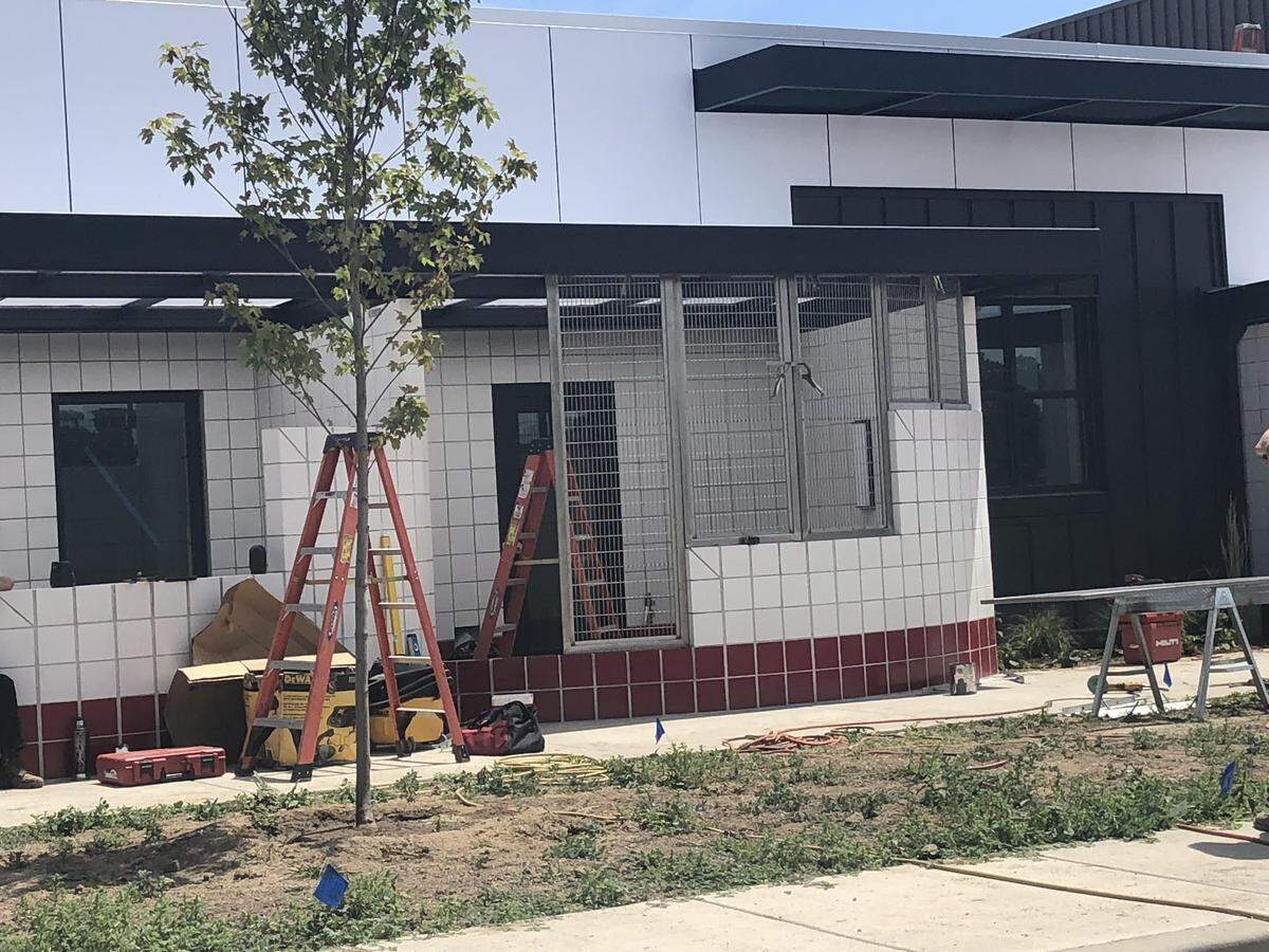 The front of the new adoption center features seven “catios,” or outdoor areas for cats.