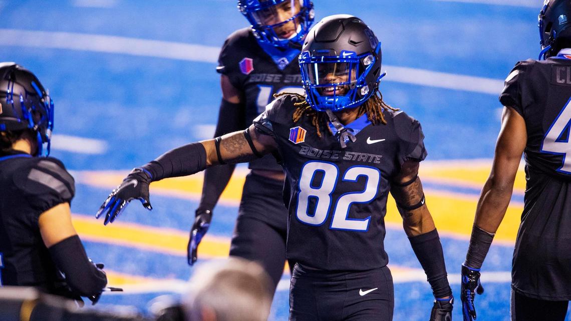 Boise State wide receiver Stefan Cobbs (82) gets in the groove with teammates as the Broncos warmup before facing No. 9 BYU Friday, Nov. 6, 2020 at Albertsons Stadium in Boise.