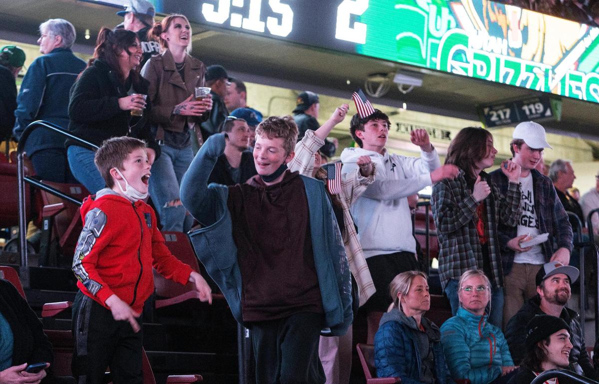 Kids dance in the stands hoping to make it onto the big screen between hockey periods at the Idaho Steelheads game at Idaho Central Arena in Boise on Wednesday.