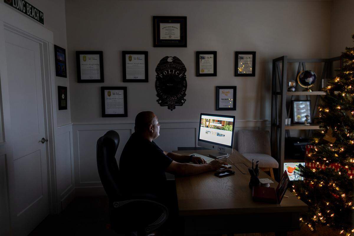 Jorge Grajeda, a retired Long Beach police officer, in his home office near Eagle. When Grajeda visited Idaho he was struck by how safe he felt. “That’s how it used to be when I was a little kid,” he said.