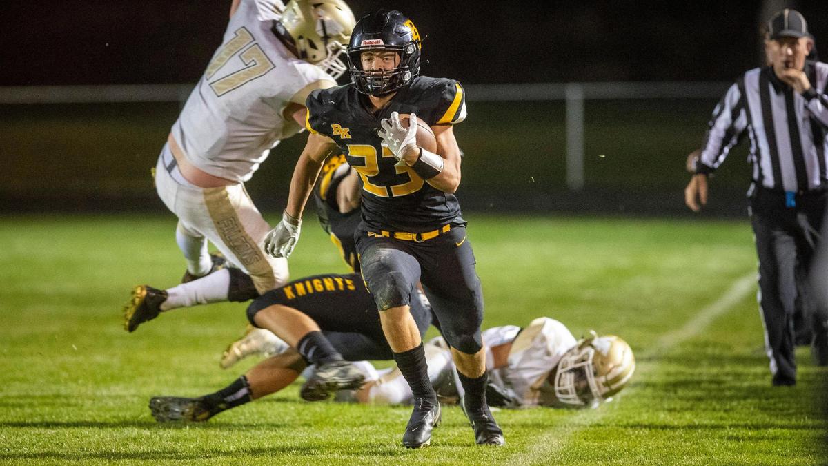 Seth Knothe leaves defenders in the dust to score a touchdown against Vallivue last fall.