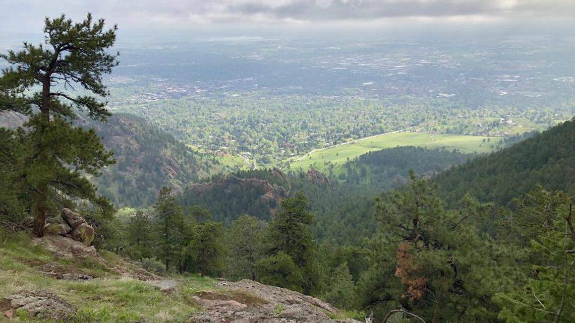 A man was hiking and scrambling down the E.M. Greenman Trail in Boulder, Colorado with his family when he tumbled down a cliff and died, authorities said.
