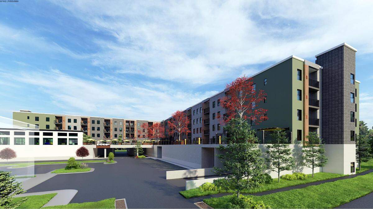 Kal Pacific proposed a five-story, 136-unit apartment building, shown in this rendering, with ground floor retail, a property management office and self-storage units on three parcels near the Boise Towne Square mall. A Mattress Firm store is just out of frame at left.