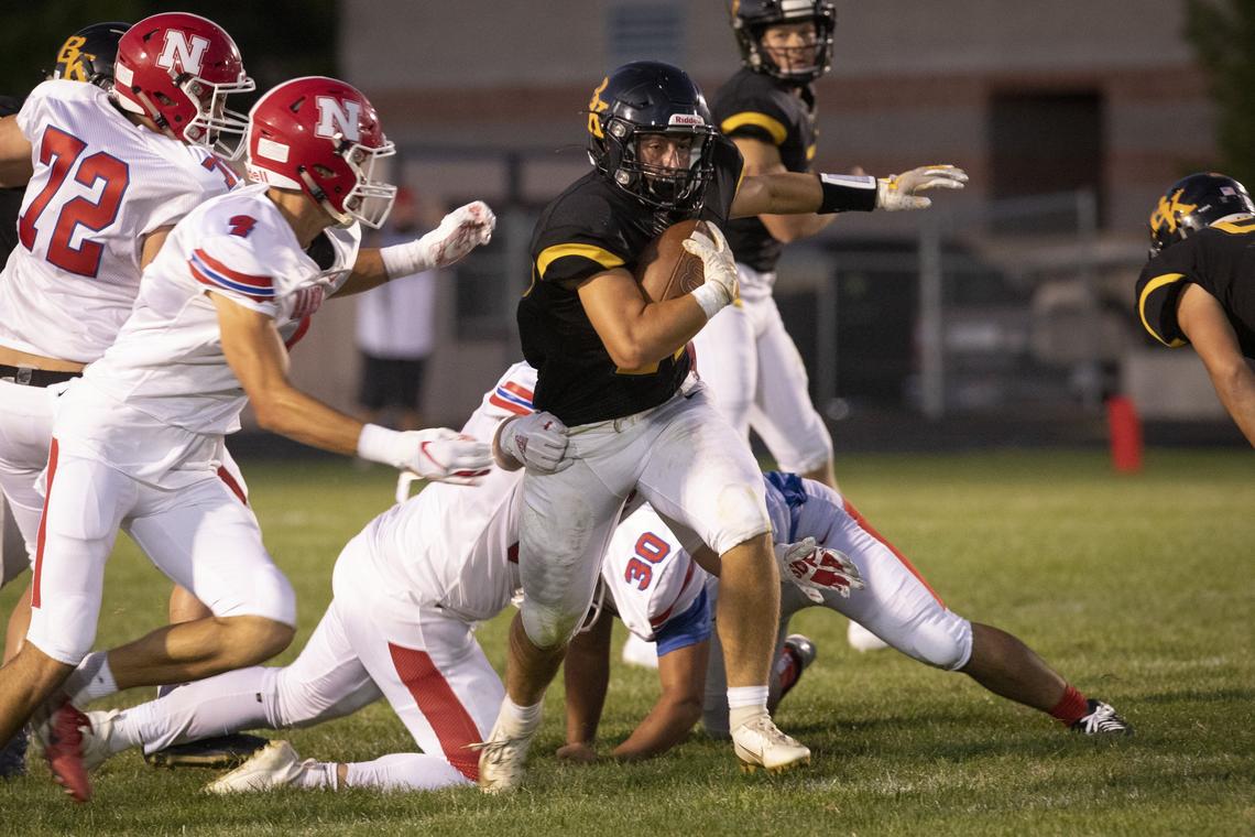 Bishop Kelly’s Ian Arellano eludes the Nampa defense Friday night.