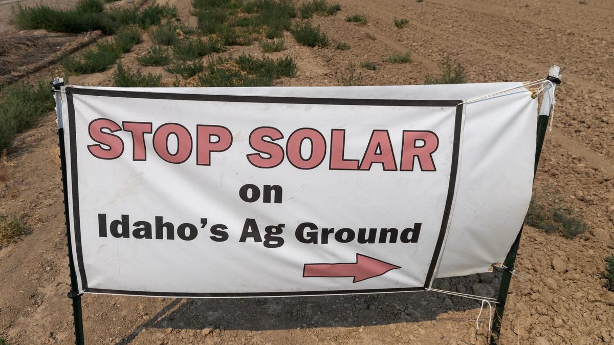 A sign along Kuna Cave Road urges action to stop a proposed solar farm nearby.