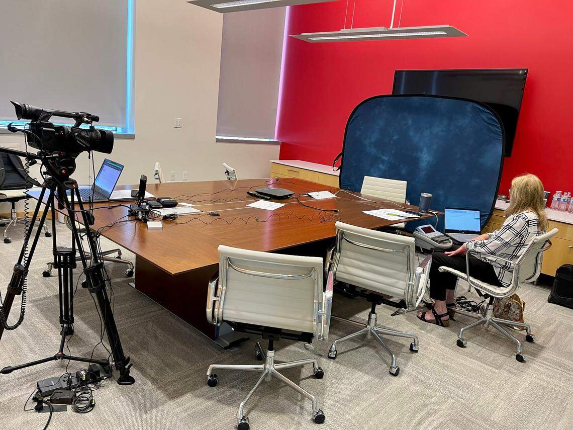 An Ada County court reporter waits for Ammon Bundy to appear at his May 10 deposition.
