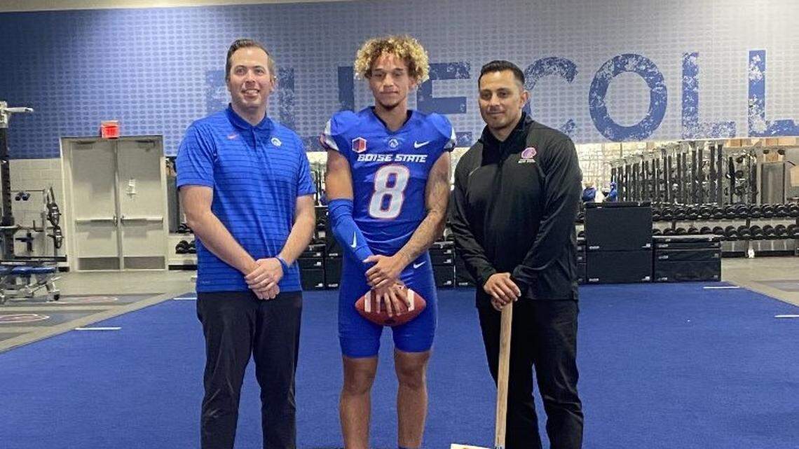 Boise State quarterback CJ Tiller poses with head coach Andy Avalos, right, and former Boise State offensive coordinator Tim Plough. Tiller was one of 22 recruits who signed with Boise State on Wednesday.