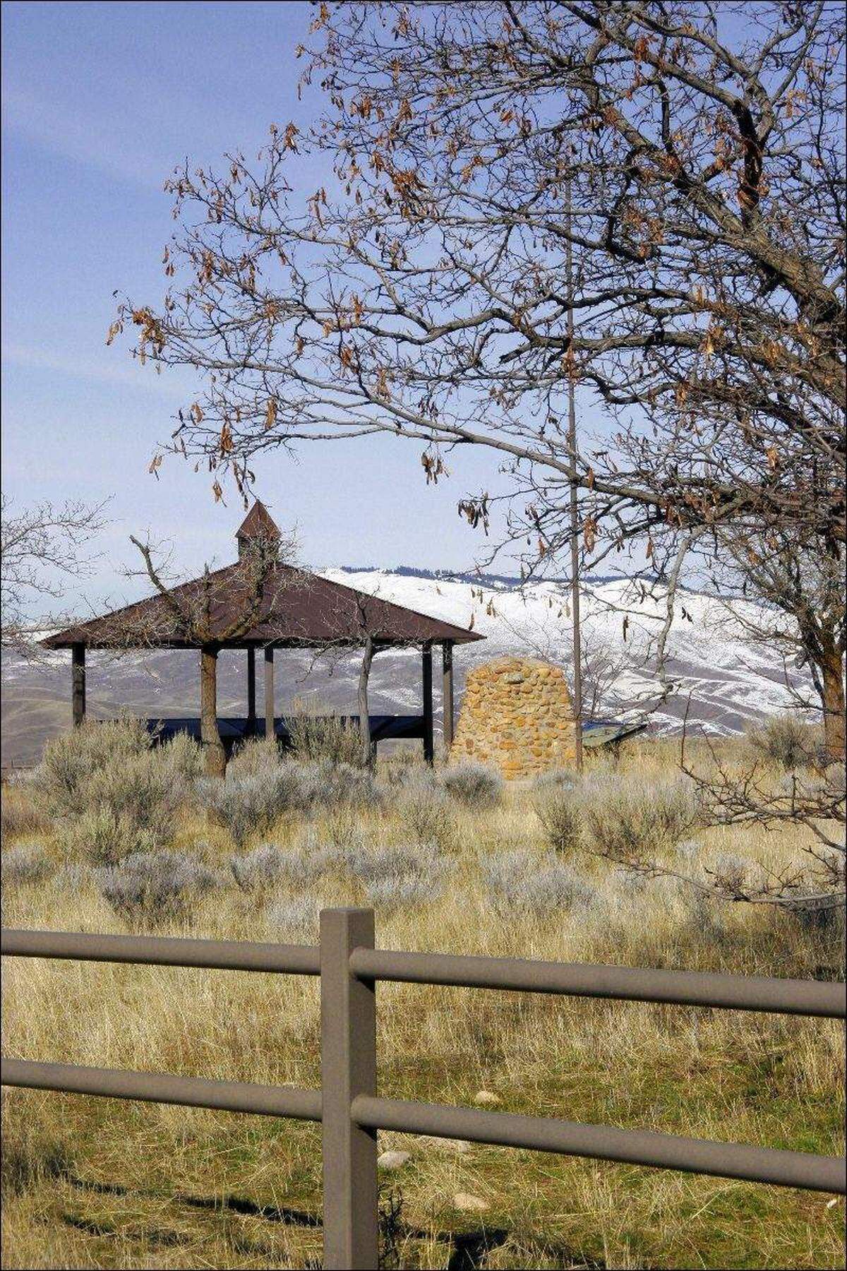 Bonneville Point 10 miles east of Boise was on an Indian trail before becoming a portion of the Oregon Trail. Capt. Bonneville’s party reached the area in May 1833. They exclaimed “Les Bois, Les Bois” or “the woods, the woods.” Because they could see trees along the Boise River, as well as the black rocks now popular with climbers. Bonneville Point is managed by Bureau of Land Management as a historic interpretive site. The marker and interpretive signs are managed by the BLM, but the Kiwanis club oversaw the site originally. At Bonneville Point the emigrants were 1,450 miles from Independence, Mo. Â— Roger Phillips Source: www.idahohistory.net